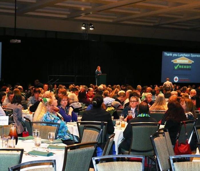 Crowd of people at luncheon